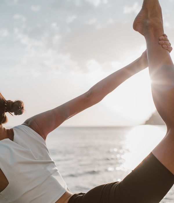 Woman in a calm yoga pose, embodying harmony and balance.